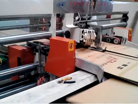 ماكينة تدبيس كرتون ذات رأسين Twin Head Stitcher