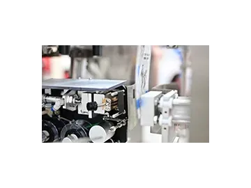 ماكينة تعبئة المعجون والصلصات فاكيوم (تغليف بتفريغ الهواء)